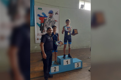 Astaralı güləşçinin və məşqçinin uğuru